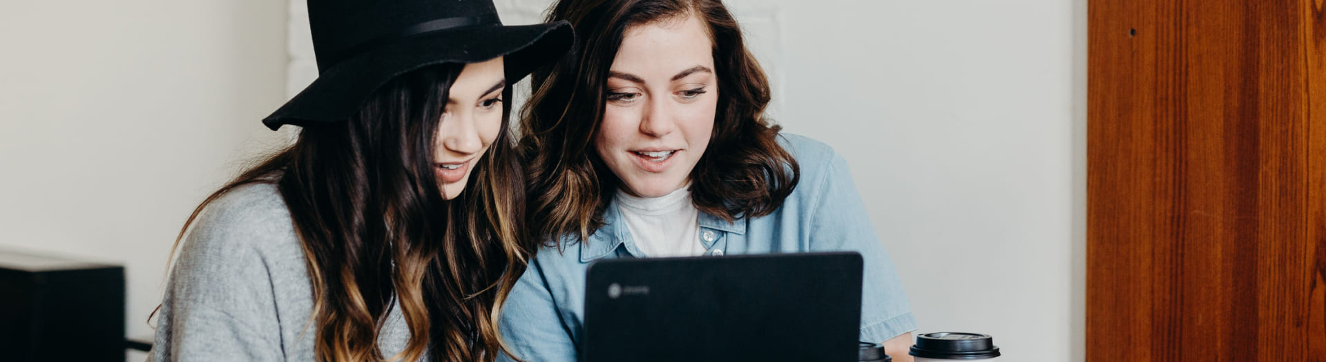 Young women looking at a tablet computer